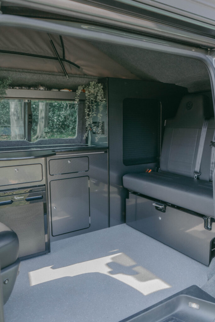 Close up of inside of Pedro the camper showing the kitchen and seats